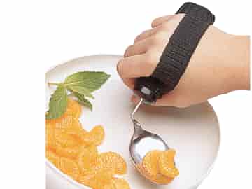 . Smart kardborreband för att hålla handen fast på skeden eller gaffeln.
